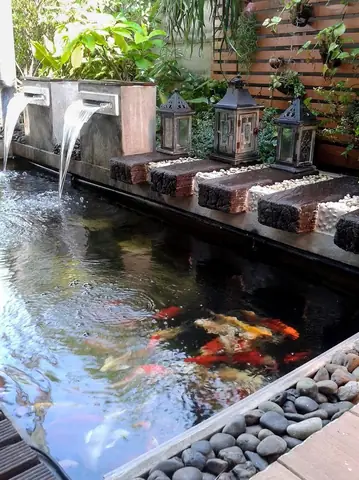 Tượng Phun Nước Bể Cá